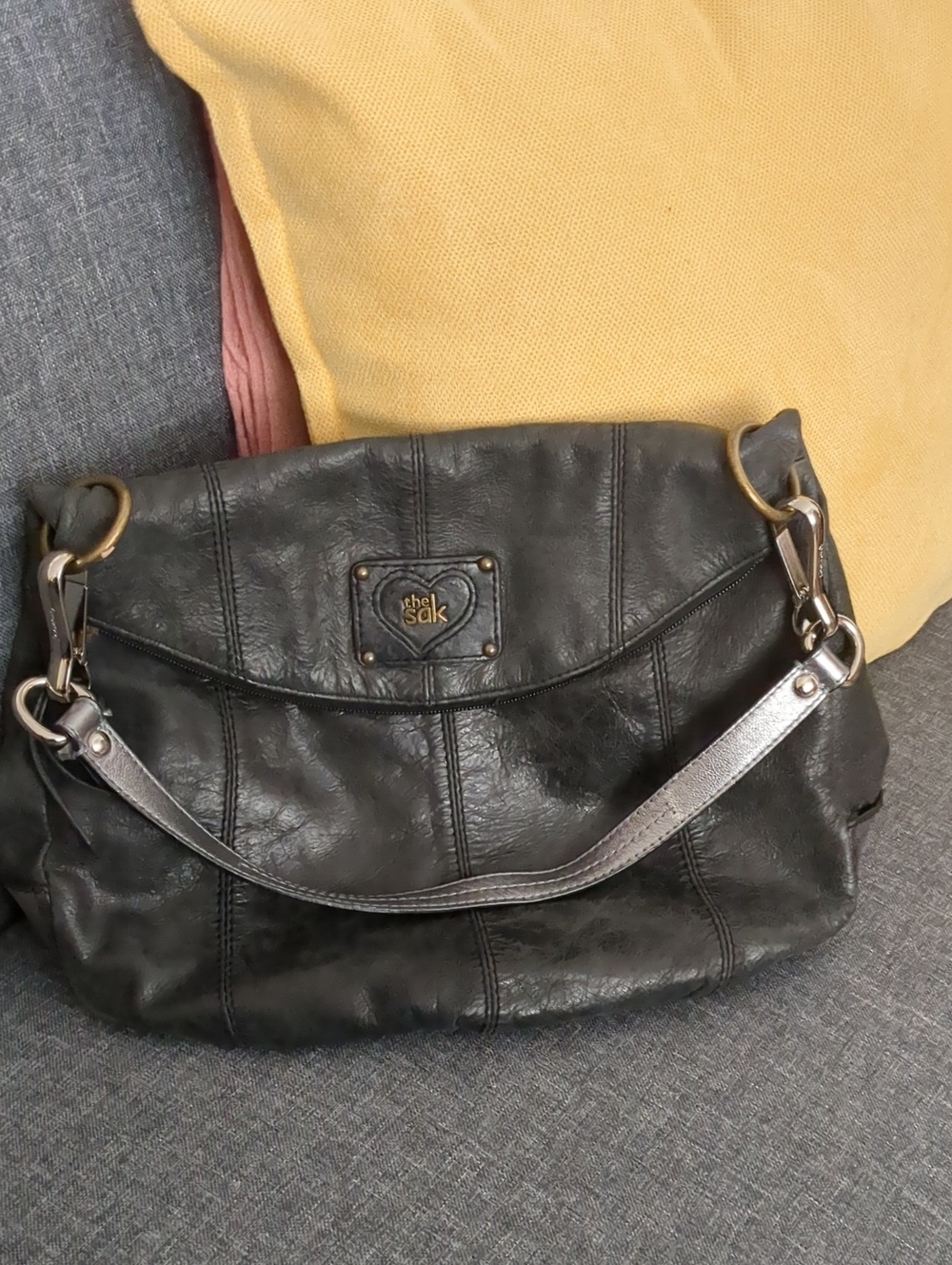 The Sak Black Leather Shoulder Bag with Silver Strap Accents